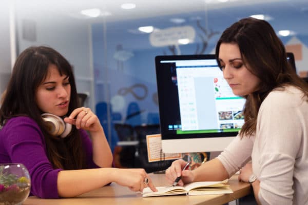 Sarah and Emily collaborating on a design